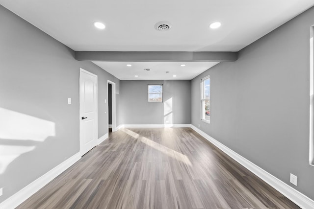 empty room featuring hardwood / wood-style floors