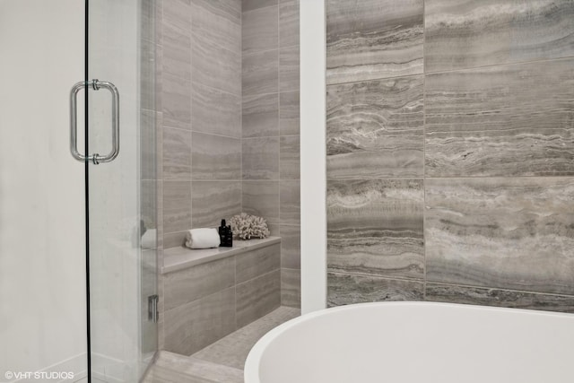 bathroom featuring a tub to relax in