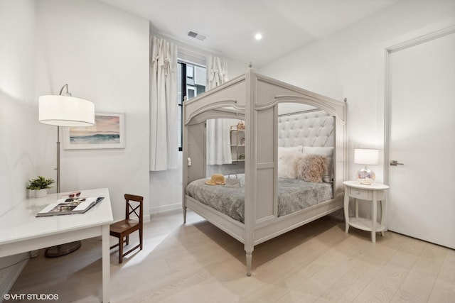 bedroom with light hardwood / wood-style flooring