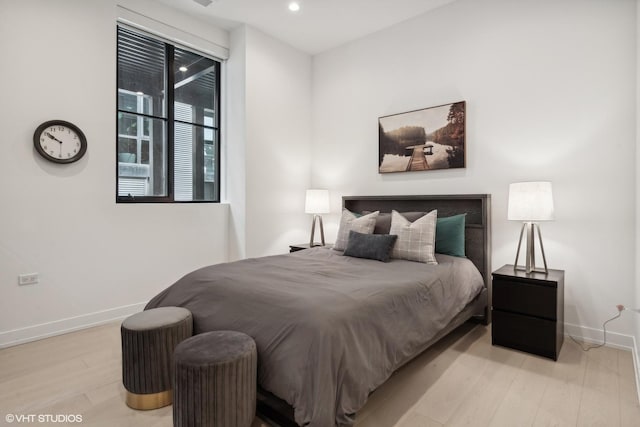 bedroom with light wood-type flooring