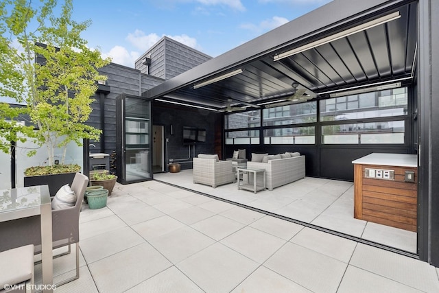 view of patio / terrace featuring outdoor lounge area and ceiling fan