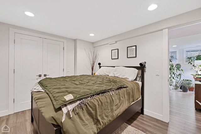 bedroom featuring hardwood / wood-style floors