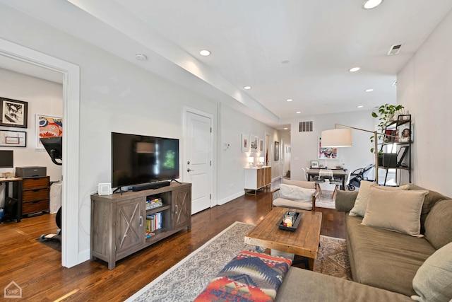 living room featuring dark hardwood / wood-style flooring