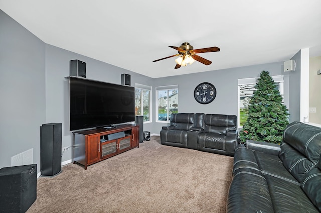 living room featuring ceiling fan and carpet floors