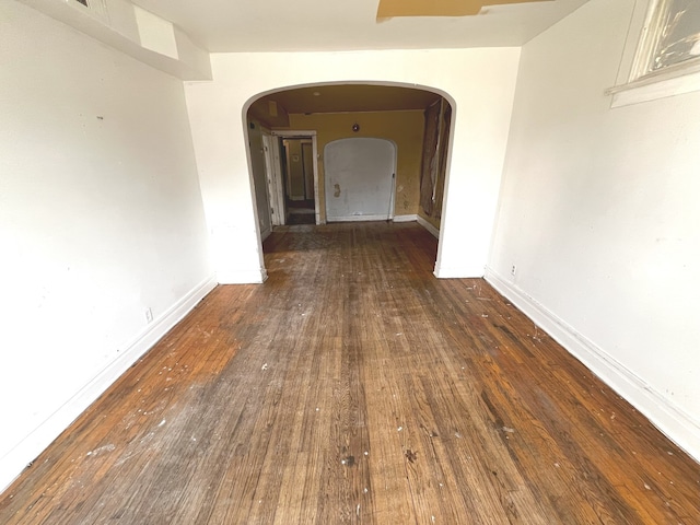 hallway featuring dark hardwood / wood-style floors