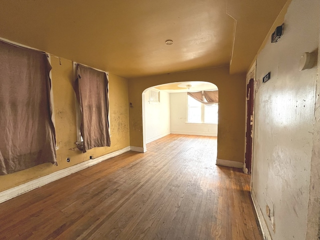 unfurnished room featuring hardwood / wood-style floors