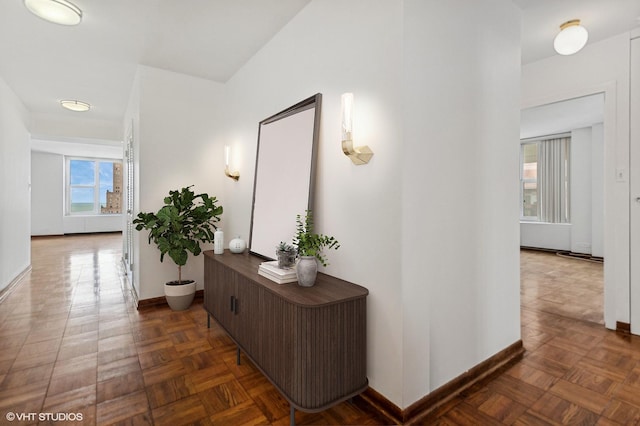 hall with dark parquet floors