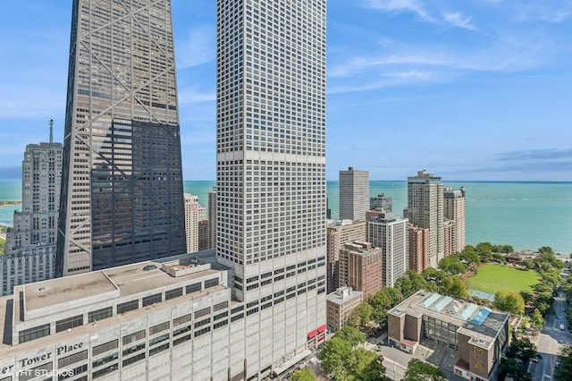 property's view of city with a water view