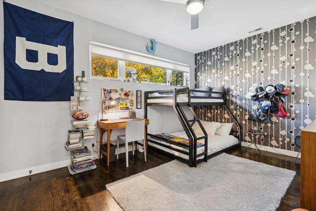 bedroom with dark wood-type flooring