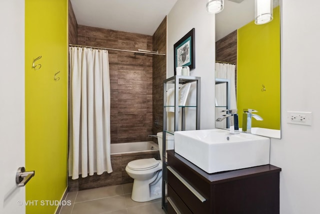 full bathroom with toilet, shower / tub combo, vanity, and tile patterned floors