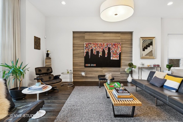 living room with dark hardwood / wood-style flooring