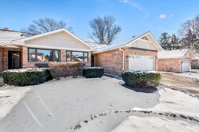 single story home featuring a garage