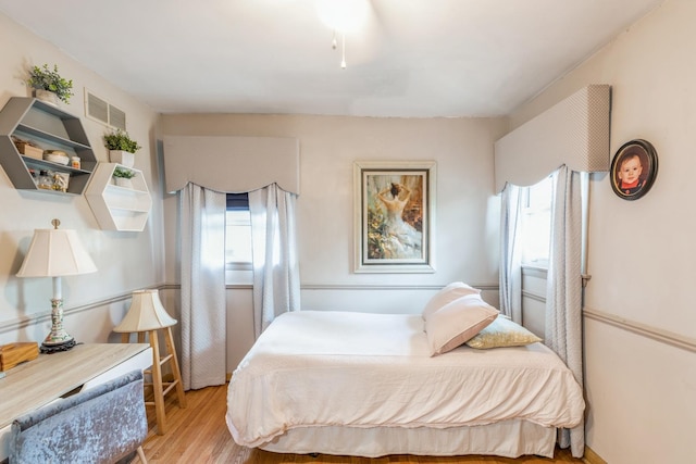 bedroom featuring light wood-type flooring