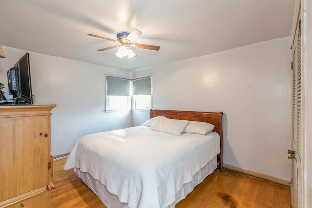 bedroom featuring ceiling fan and light wood-type flooring