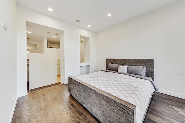 bedroom featuring hardwood / wood-style flooring