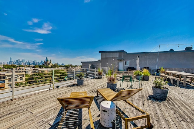 wooden deck featuring grilling area