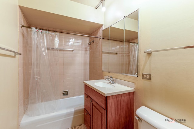 full bathroom featuring vanity, toilet, and shower / bathtub combination with curtain