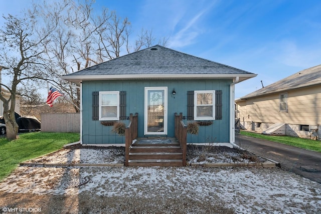 view of front of home with a front yard