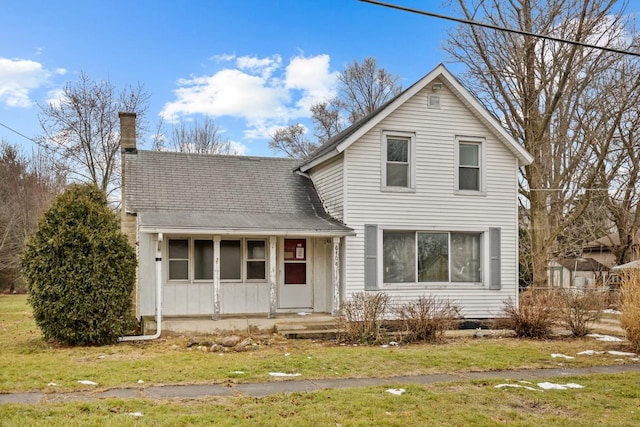 front facade with a front lawn