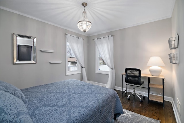 bedroom featuring crown molding and dark hardwood / wood-style flooring