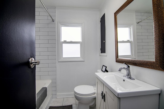 full bathroom featuring toilet, crown molding, vanity, tiled shower / bath combo, and tile patterned flooring