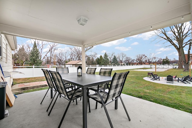 view of patio / terrace with an outdoor fire pit