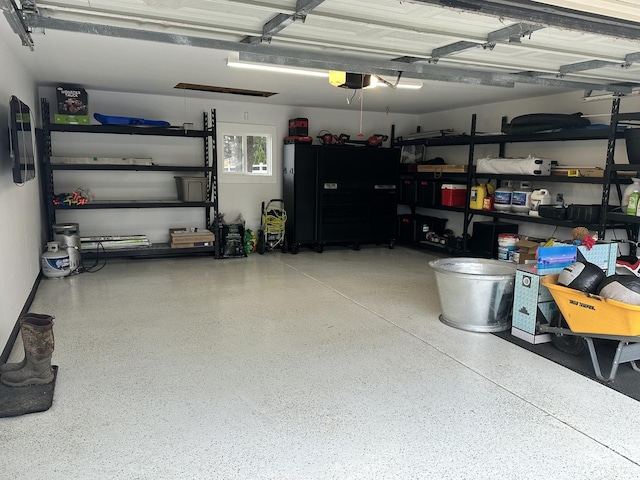 garage featuring a garage door opener