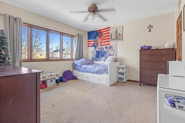 bedroom featuring ceiling fan and light colored carpet