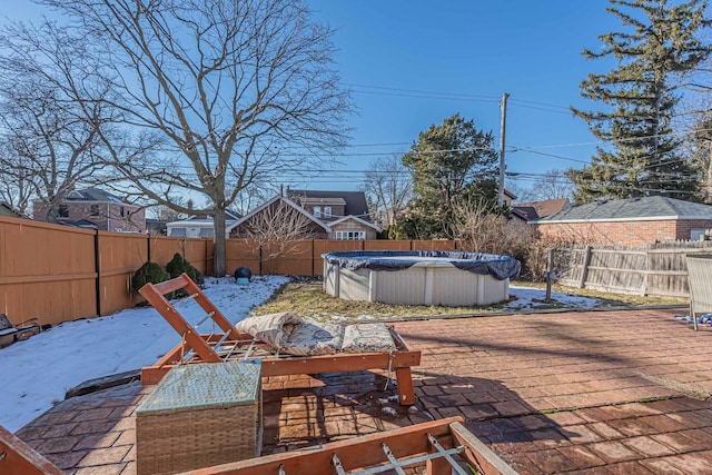 view of patio with a covered pool