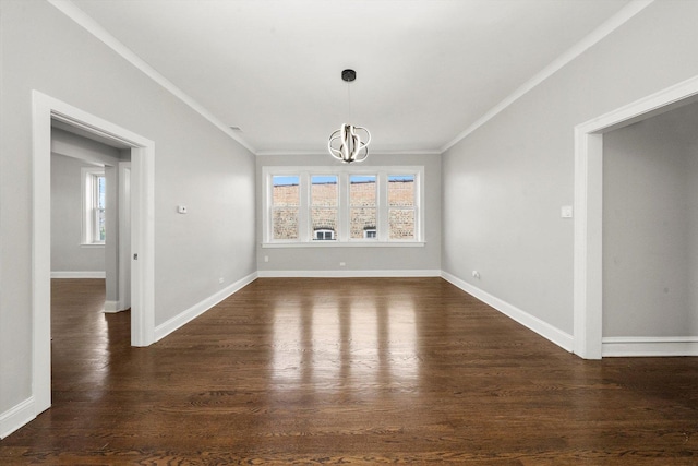 unfurnished dining area featuring dark wood-type flooring, an inviting chandelier, plenty of natural light, and ornamental molding