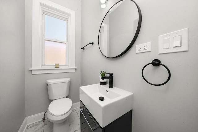 bathroom with sink and toilet