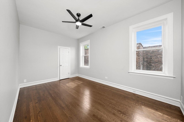 empty room featuring ceiling fan and wood-type flooring