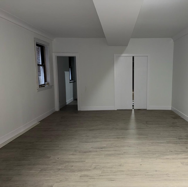 spare room with light hardwood / wood-style floors