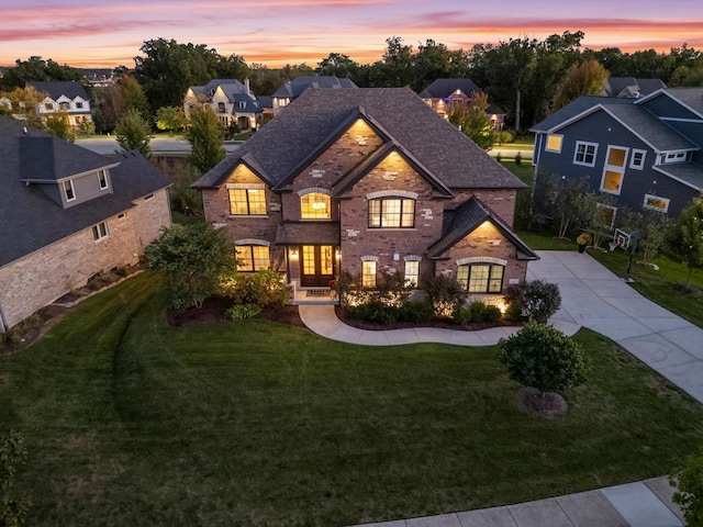 view of front of house featuring a lawn