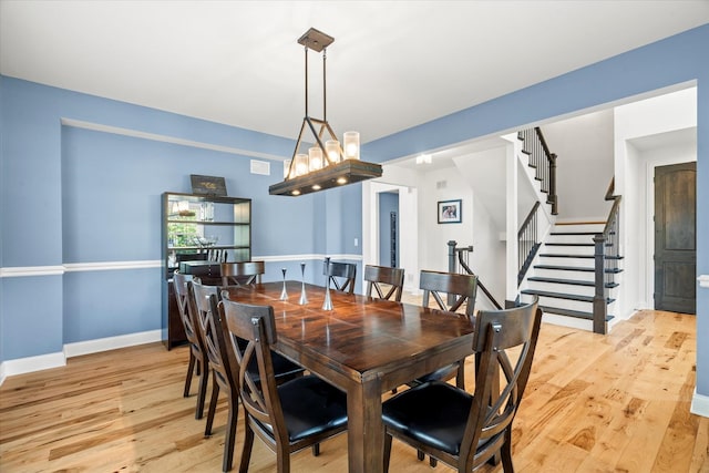 dining room featuring light hardwood / wood-style flooring