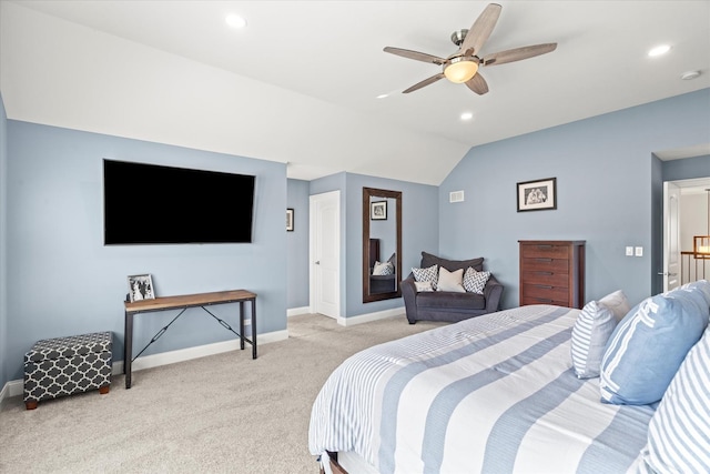 carpeted bedroom featuring vaulted ceiling and ceiling fan