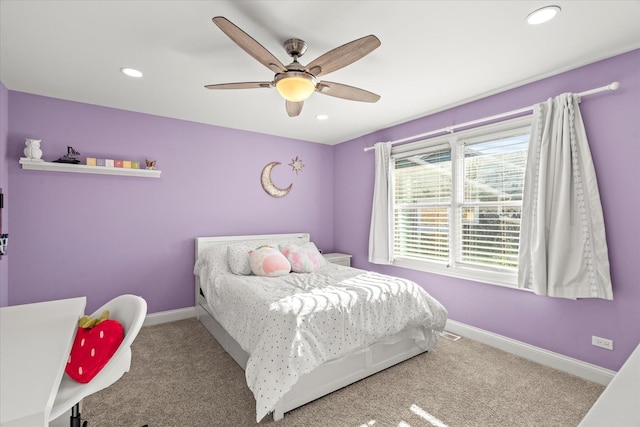 carpeted bedroom featuring ceiling fan