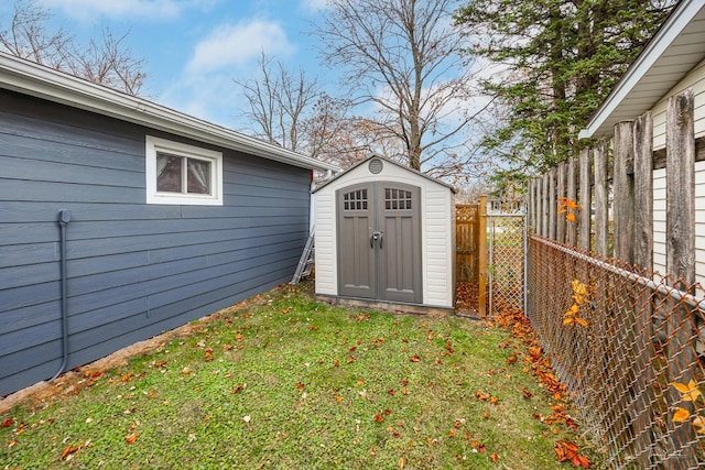 view of outdoor structure with a lawn