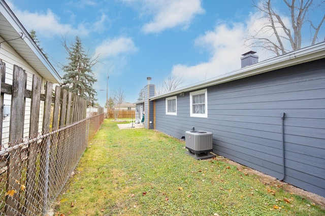 view of yard featuring central AC unit