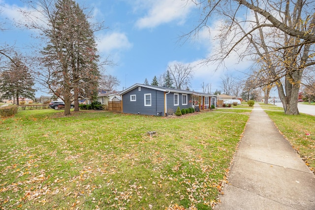 view of home's exterior featuring a yard