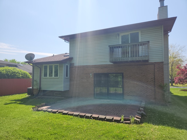17617 Central Park Ave, Hazel Crest, IL 60429 - rear view of house with a balcony and a yard