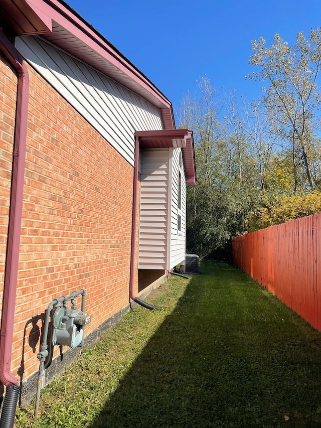 17617 Central Park Ave, Hazel Crest, IL 60429 - view of side of property with a lawn