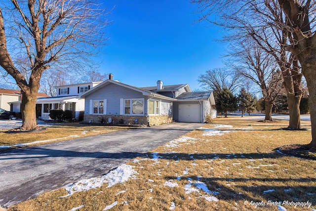 view of front of property featuring a garage