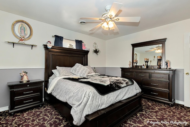 carpeted bedroom with ceiling fan