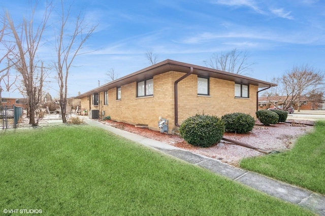 view of home's exterior featuring a yard