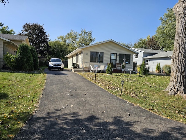 view of front of property with a front lawn