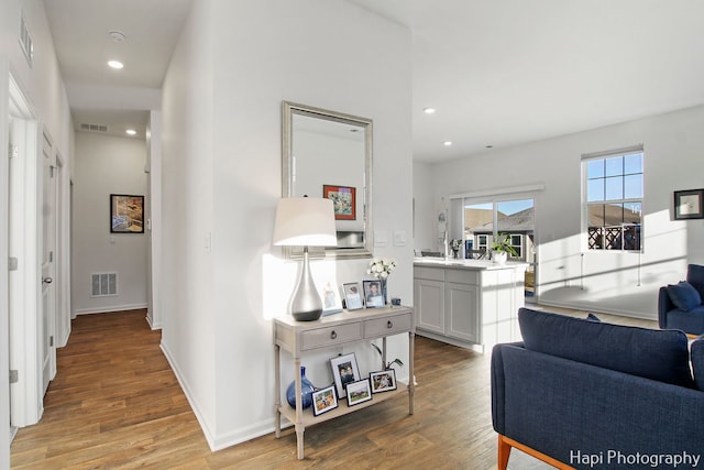 hall featuring light hardwood / wood-style floors