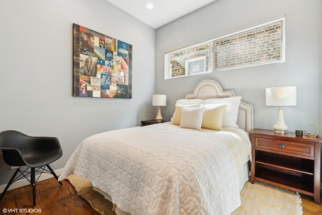 bedroom with wood-type flooring