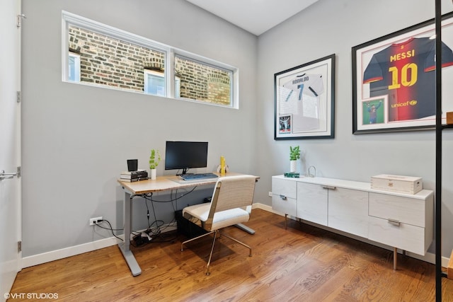 office area featuring hardwood / wood-style floors and a healthy amount of sunlight