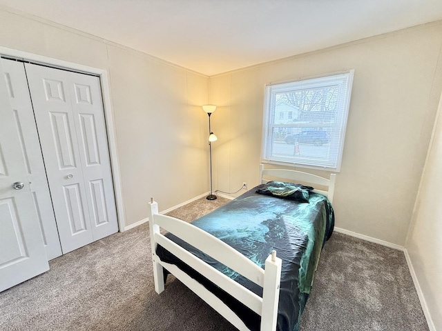 bedroom with a closet and carpet floors